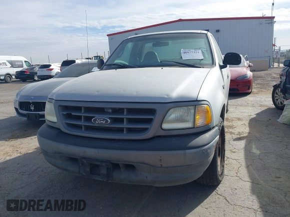2002 Ford F-150 XL with VIN 3FTRF17212MA13777, listed as a IAAI auction lot 40977321 with 1 mi miles. Bid and sale history available at carsss.com. Image 12.