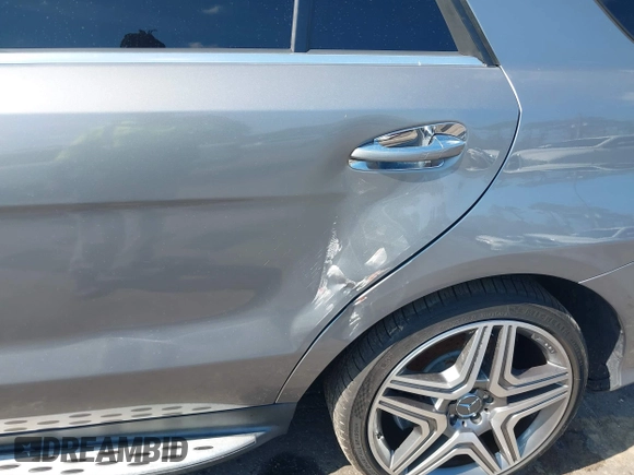 2013 Mercedes-Benz M ML 63 AMG with VIN 4JGDA7EB9DA155725, listed as a IAAI auction lot 41502675 with 64,849 mi miles. Bid and sale history available at carsss.com. Image 6.