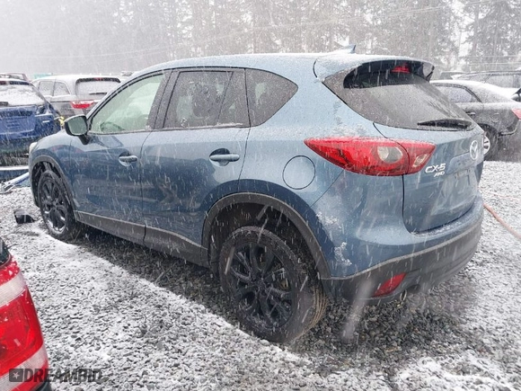 2016 Mazda CX-5 Grand Touring with VIN JM3KE4DY4G0687230, listed as a IAAI auction lot 41510915 with NaN miles. Bid and sale history available at carsss.com. Image 3.
