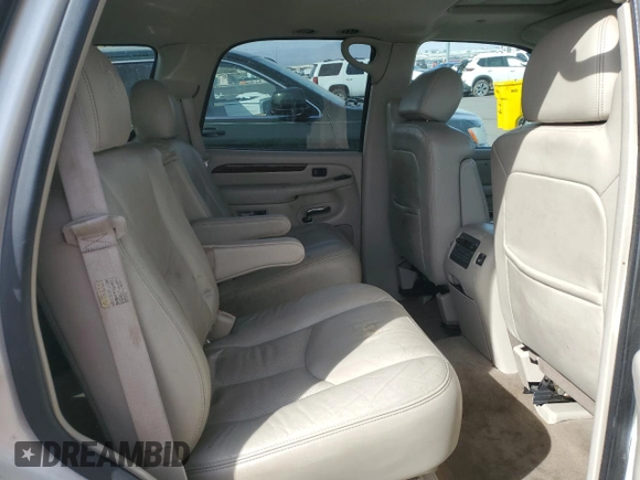 2004 Cadillac Escalade z VIN 1GYEC63T44R185526, wystawiony jako Copart lot #50969335 z przebiegiem 129 386 mil mil oraz Szkoda całkowita • Salvage title. Historia ofert i sprzedaży dostępna na DreamBid. Obrazek 11.