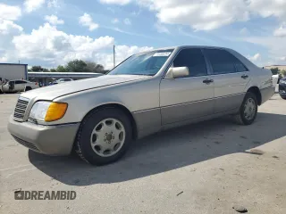1994 Mercedes-Benz S with VIN WDBGA51E3RA159510, listed as a Copart auction lot 74456224 with 153,877 mi miles and Clean Title. Bid and sale history available at DreamBid. Image 1.