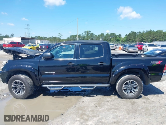 2015 Toyota Tacoma z VIN 3TMLU4EN3FM186765, wystawiony jako IAAI lot #42235553 z przebiegiem 183 878 mil mil oraz . Historia ofert i sprzedaży dostępna na DreamBid. Obrazek 15.