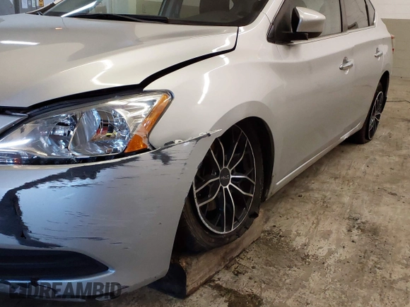 2014 Nissan Sentra S with VIN 3N1AB7AP6EY299710, listed as a IAAI auction lot 41505297 with 124,994 mi miles and . Bid and sale history available at DreamBid. Image 6.