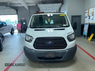 2016 Ford Transit Cargo with VIN 1FTYE1YM8GKB48865, listed as a IAAI auction lot 42843472 with 184,635 mi miles and . Bid and sale history available at DreamBid. Image 16.