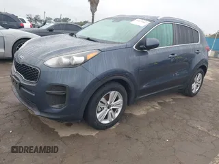 2018 Kia Sportage LX with VIN KNDPM3ACXJ7413596, listed as a IAAI auction lot 41871847 with 72,959 mi miles and . Bid and sale history available at carsss.com. Image 2.
