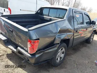 2011 Honda Ridgeline RT z VIN 5FPYK1F26BB453191, wystawiony jako IAAI lot #41776280 z przebiegiem 122 908 mil mil oraz . Historia ofert i sprzedaży dostępna na DreamBid. Obrazek 4.