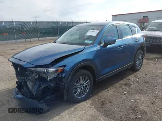 2018 Mazda CX-5 Sport with VIN JM3KFBBM0J0331656, listed as a IAAI auction lot 41966948 with 117,213 mi miles. Bid and sale history available at carsss.com. Image 2.
