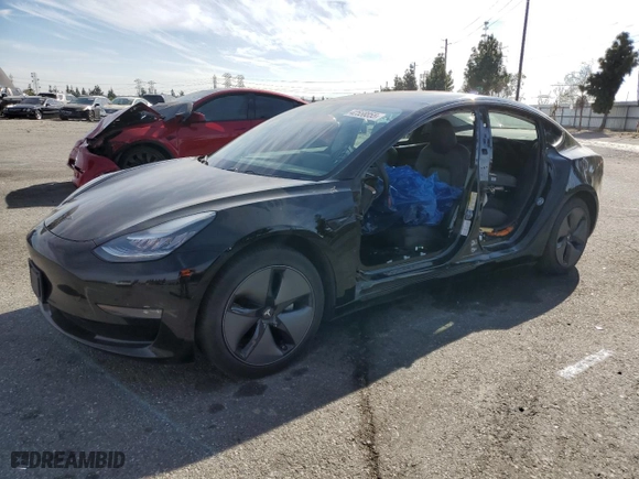 2019 Tesla Model 3 Mid Range with VIN 5YJ3E1EA6KF361663, listed as a Copart auction lot 42558855 with 84,766 mi miles and Salvage Title. Bid and sale history available at carsss.com. Image 1.
