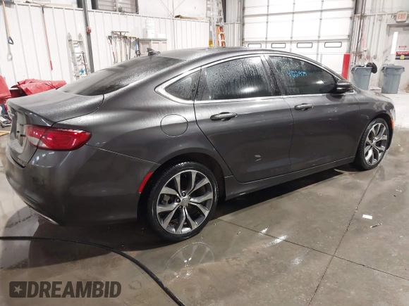 2015 Chrysler 200 C with VIN 1C3CCCCG1FN551259, listed as a IAAI auction lot 41221979 with 98,055 mi miles and . Bid and sale history available at carsss.com. Image 4.