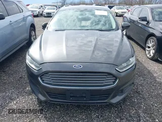 2016 Ford Fusion S z VIN 3FA6P0G79GR152156, wystawiony jako IAAI lot #41958709 z przebiegiem 204 668 mil mil oraz . Historia ofert i sprzedaży dostępna na DreamBid. Obrazek 6.