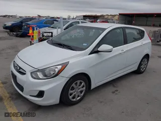 2012 Hyundai Accent GS with VIN KMHCT5AE4CU051716, listed as a IAAI auction lot 41692287 with 173,861 mi miles. Bid and sale history available at carsss.com. Image 2.