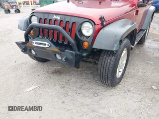 2012 Jeep Wrangler Sport with VIN 1C4AJWAG3CL197295, listed as a IAAI auction lot 42349118 with 117,381 mi miles and . Bid and sale history available at DreamBid. Image 6.