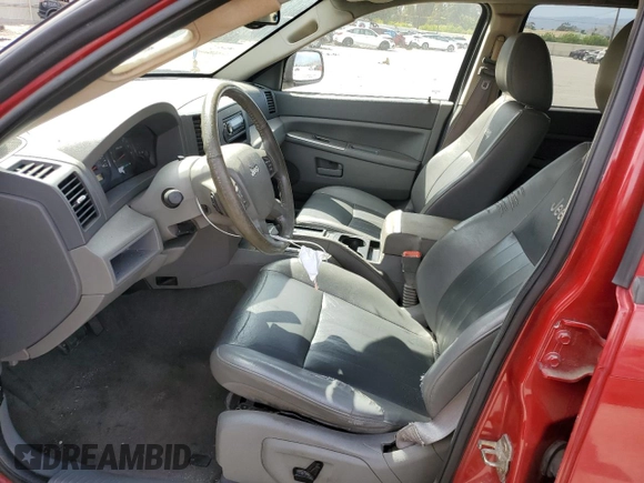 2005 Jeep Grand Cherokee with VIN 1J8HS48N55C658562, listed as a Copart auction lot 56601705 with 178,522 mi miles and Clean title. Bid and sale history available at DreamBid. Image 7.