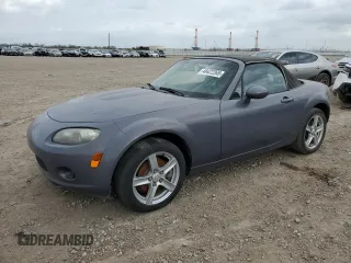 2007 Mazda MX-5 Miata Sport z VIN JM1NC25F970134960, wystawiony jako Copart lot #48422265 z przebiegiem 149 357 mil mil oraz Tytuł czysty. Historia ofert i sprzedaży dostępna na DreamBid. Obrazek 1.