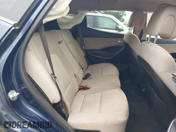 2017 Hyundai Santa Fe 2.4L z VIN 5XYZUDLB9HG421284, wystawiony jako IAAI lot #42441436 z przebiegiem 96 155 mil mil oraz . Historia ofert i sprzedaży dostępna na DreamBid. Obrazek 8.