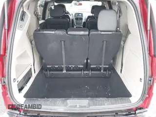 2014 Dodge Grand Caravan SXT with VIN 2C4RDGCG3ER257695, listed as a IAAI auction lot 41534568 with 116,896 mi miles and . Bid and sale history available at DreamBid. Image 21.