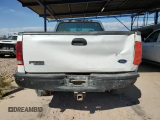 2001 Ford F-250 with VIN 3FTNX21L21MA60236, listed as a Copart auction lot 74987434 with 147,175 mi miles and Salvage title. Bid and sale history available at DreamBid. Image 6.