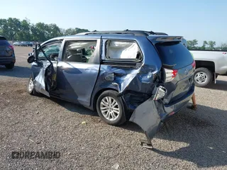 2014 Toyota Sienna XLE with VIN 5TDYK3DCXES524294, listed as a IAAI auction lot 42546467 with 122,257 mi miles and . Bid and sale history available at DreamBid. Image 3.