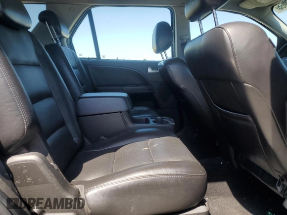 2005 Ford Freestyle Limited z VIN 1FMDK06165GA16290, wystawiony jako Copart lot #55596965 z przebiegiem Nie podano mil oraz Szkoda całkowita • Salvage title. Historia ofert i sprzedaży dostępna na DreamBid. Obrazek 11.