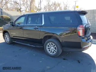 2021 Chevrolet Suburban LT with VIN 1GNSCCKD0MR132993, listed as a Copart auction lot 88129455 with 166,216 mi miles and Salvage Title. Bid and sale history available at carsss.com. Image 2.