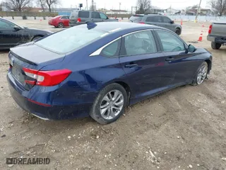 2018 Honda Accord Sedan LX 1.5T with VIN 1HGCV1F18JA042031, listed as a IAAI auction lot 41828316 with 130,864 mi miles. Bid and sale history available at carsss.com. Image 4.