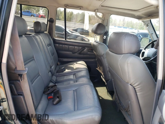1995 Toyota Land Cruiser z VIN JT3DJ81W9S0112464, wystawiony jako Copart lot #49925395 z przebiegiem 215 698 mil mil oraz Czysty tytuł • Clean title. Historia ofert i sprzedaży dostępna na DreamBid. Obrazek 11.