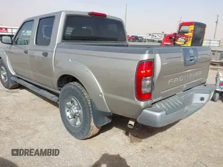 2004 Nissan Frontier XE z VIN 1N6ED27T54C427374, wystawiony jako IAAI lot #41712499 z przebiegiem 218 902 mil mil oraz . Historia ofert i sprzedaży dostępna na DreamBid. Obrazek 3.