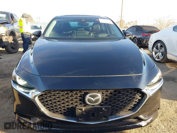 2020 Mazda 3 Premium with VIN 3MZBPAEM2LM124405, listed as a IAAI auction lot 41478818 with 72,551 mi miles and . Bid and sale history available at DreamBid. Image 13.