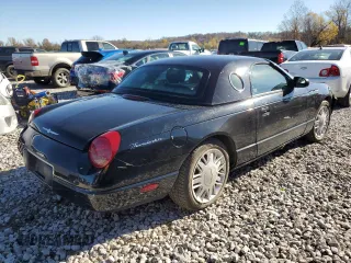 2003 Ford Thunderbird Deluxe with VIN 1FAHP60A63Y110587, listed as a Copart auction lot 78423314 with 119,172 mi miles and Salvage Title. Bid and sale history available at DreamBid. Image 3.