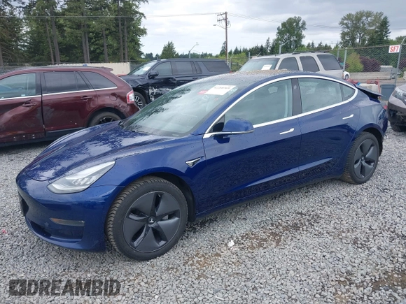 2018 Tesla Model 3 Long Range Battery z VIN 5YJ3E1EBXJF092025, wystawiony jako IAAI lot #42268369 z przebiegiem 132 687 mil mil oraz . Historia ofert i sprzedaży dostępna na DreamBid. Obrazek 2.
