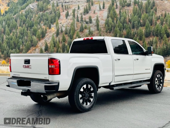 2018 GMC Sierra 2500HD SLT with VIN 1GT12TEY8JF232441, listed as a Copart auction lot 80102474 with 116,458 mi miles and Salvage Title. Bid and sale history available at carsss.com. Image 4.