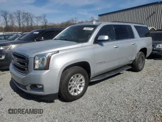 2018 GMC Yukon XL SLT with VIN 1GKS1GKCXJR328985, listed as a Copart auction lot 49485935 with 114,927 mi miles and Salvage Title. Bid and sale history available at carsss.com. Image 1.