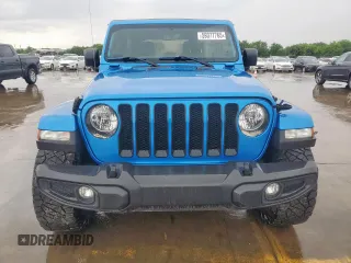 2023 Jeep Wrangler Sahara with VIN 1C4HJXEG7PW590252, listed as a Copart auction lot 59377765 with 32,689 mi miles and Salvage title. Bid and sale history available at DreamBid. Image 5.