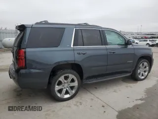 2019 Chevrolet Tahoe LT with VIN 1GNSKBKCXKR212450, listed as a Copart auction lot 54433205 with 119,907 mi miles and Salvage title. Bid and sale history available at DreamBid. Image 3.