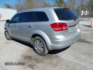 2014 Dodge Journey American Value Pkg with VIN 3C4PDCAB7ET259230, listed as a IAAI auction lot 41675179 with 151,386 mi miles. Bid and sale history available at carsss.com. Image 3.
