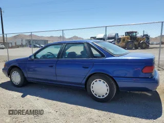 1994 Ford Taurus GL z VIN 1FALP5246RG126184, wystawiony jako Copart lot #67615014 z przebiegiem 95 189 mil mil oraz Szkoda całkowita • Salvage title. Historia ofert i sprzedaży dostępna na DreamBid. Obrazek 2.