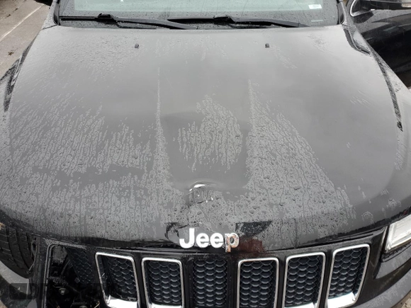 2015 Jeep Grand Cherokee Overland with VIN 1C4RJFCG7FC925995, listed as a Copart auction lot 85421214 with 142,266 mi miles and Salvage Title. Bid and sale history available at carsss.com. Image 12.