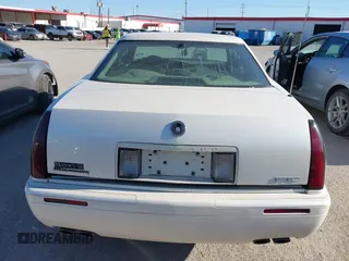 2000 Cadillac Eldorado Touring ETC z VIN 1G6ET1292YU188056, wystawiony jako IAAI lot #41671661 z przebiegiem 139 138 mil mil oraz . Historia ofert i sprzedaży dostępna na DreamBid. Obrazek 6.