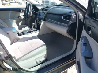 2012 Toyota Camry Hybrid XLE with VIN 4T1BD1FK0CU020723, listed as a IAAI auction lot 42031093 with 121,297 mi miles. Bid and sale history available at carsss.com. Image 5.
