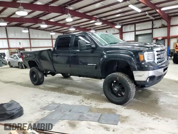 2012 GMC Sierra 2500HD SLE z VIN 1GT120CG6CF169156, wystawiony jako Copart lot #52860205 z przebiegiem 106 505 mil mil oraz Szkoda całkowita • Salvage title. Historia ofert i sprzedaży dostępna na DreamBid. Obrazek 11.