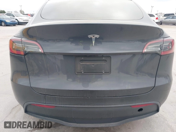 2024 Tesla Model Y with VIN 7SAYGDED3RF002246, listed as a IAAI auction lot 41566184 with 10,316 mi miles and . Bid and sale history available at DreamBid. Image 15.