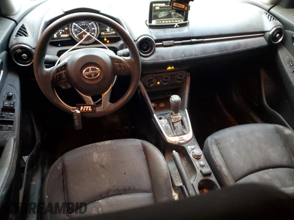 2016 Scion iA z VIN 3MYDLBZVXGY142781, wystawiony jako Copart lot #51987175 z przebiegiem 129 288 mil mil oraz Nie do naprawy • Non repairable. Historia ofert i sprzedaży dostępna na DreamBid. Obrazek 8.