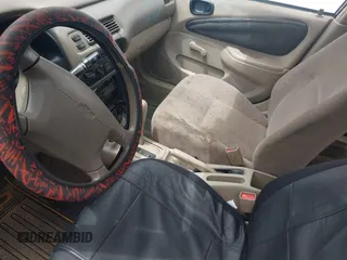 2000 Chevrolet Prizm LSi z VIN 1Y1SK5285YZ407771, wystawiony jako IAAI lot #42240643 z przebiegiem 237 408 mil mil oraz . Historia ofert i sprzedaży dostępna na DreamBid. Obrazek 13.