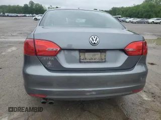 2013 Volkswagen Jetta S with VIN 3VW2K7AJ4DM318853, listed as a Copart auction lot 57597955 with 165,023 mi miles and Salvage title. Bid and sale history available at DreamBid. Image 6.