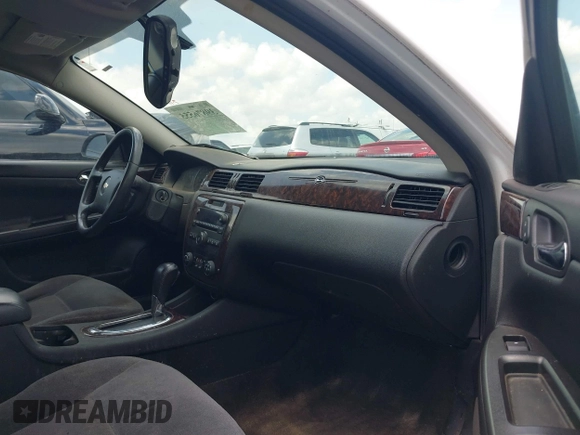 2013 Chevrolet Impala LT with VIN 2G1WG5E35D1215821, listed as a IAAI auction lot 39876555 with 152,325 mi miles and . Bid and sale history available at DreamBid. Image 5.