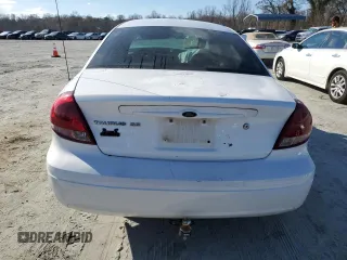 2007 Ford Taurus SE z VIN 1FAFP53U47A169014, wystawiony jako Copart lot #51858765 z przebiegiem Nie podano mil oraz Szkody całkowita. Historia ofert i sprzedaży dostępna na DreamBid. Obrazek 6.