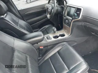 2015 Jeep Grand Cherokee Limited z VIN 1C4RJFBG6FC717026, wystawiony jako IAAI lot #42078788 z przebiegiem 106 755 mil mil oraz . Historia ofert i sprzedaży dostępna na DreamBid. Obrazek 5.