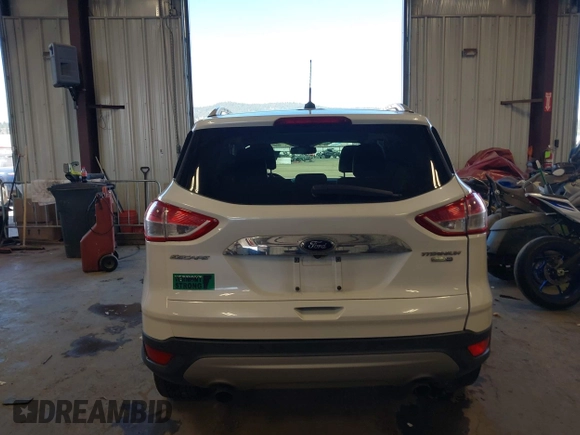 2016 Ford Escape Titanium with VIN 1FMCU9J94GUC28648, listed as a IAAI auction lot 42043761 with 82,509 mi miles and . Bid and sale history available at DreamBid. Image 16.