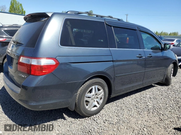 2005 Honda Odyssey EX with VIN 5FNRL38415B009502, listed as a Copart auction lot 53872455 with 205,051 mi miles and Salvage title. Bid and sale history available at DreamBid. Image 3.