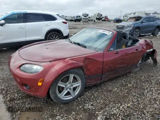 2006 Mazda MX-5 Miata Touring z VIN JM1NC25F260121773, wystawiony jako Copart lot #55887175 z przebiegiem Nie podano mil oraz Szkoda całkowita • Salvage title. Historia ofert i sprzedaży dostępna na DreamBid. Obrazek 1.